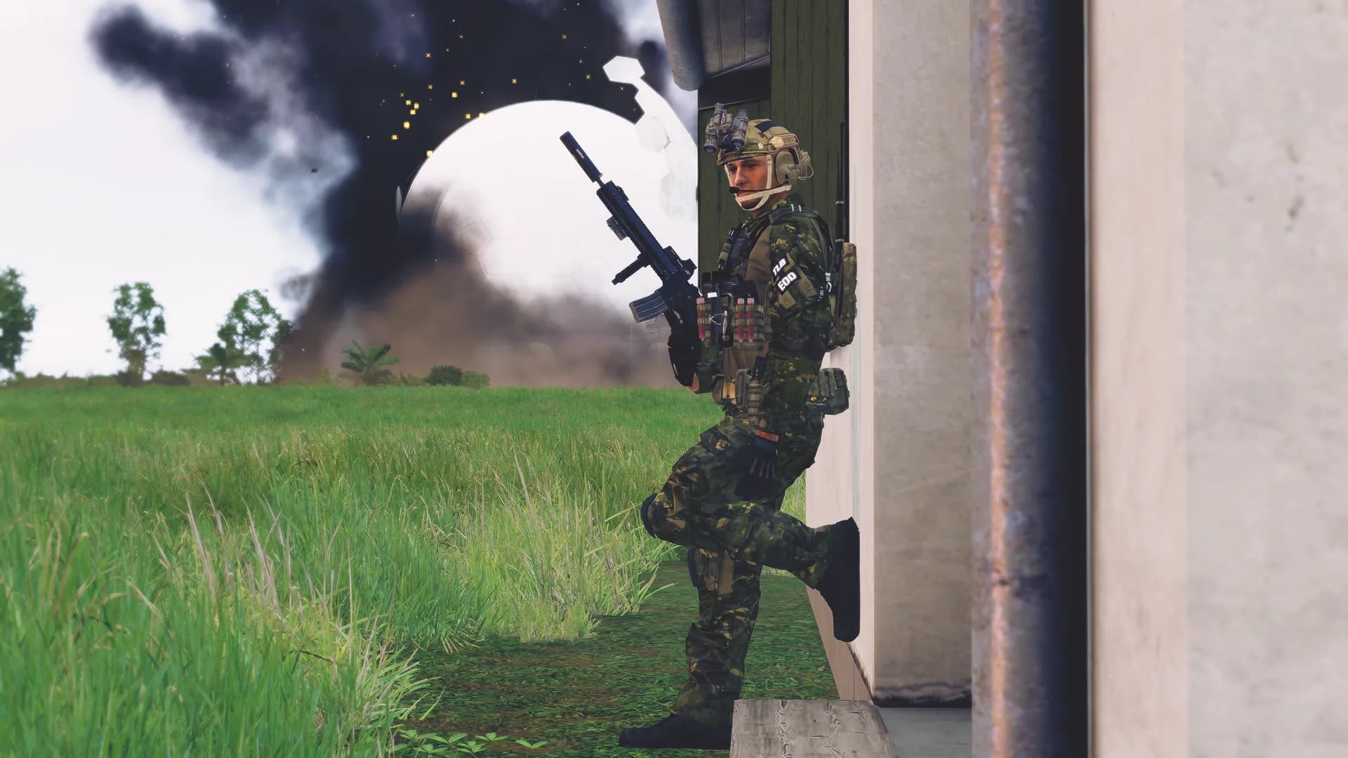 Sappers working a wall breach in a walled compound