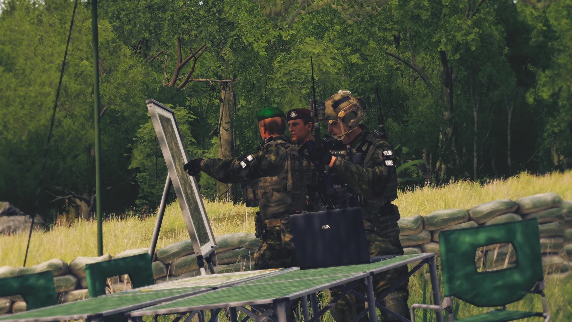 Command element working a map board during mission planning